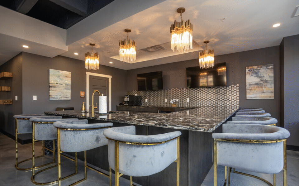 Amenity bar with marble counters and FlowStone floor